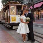 Elopement photography in front of a San Francisco Trolly Car